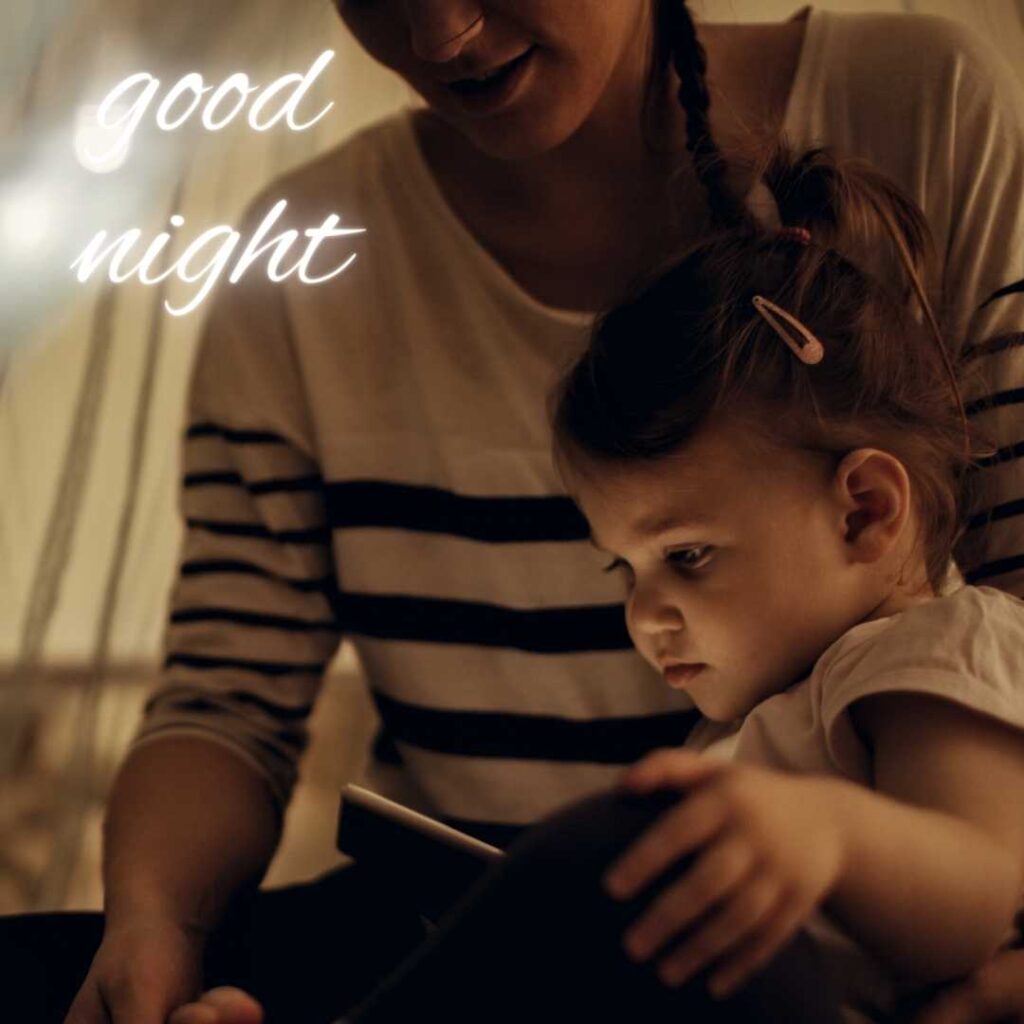 Good-Night-Images-A cute Boy Celebrating night time with Mother