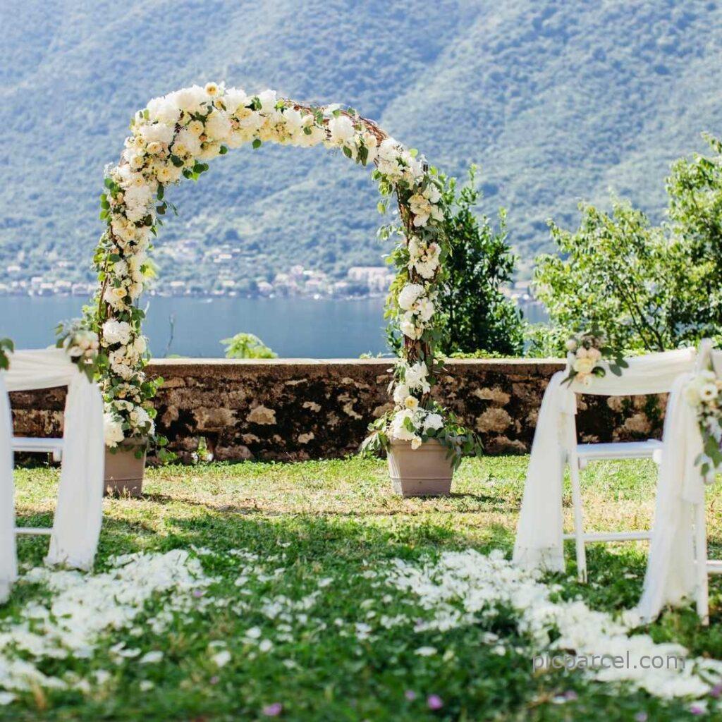 flower decoration images-lake view besides hill  decoration with white colour flower vines images- flower decoration images with white flower-flower images